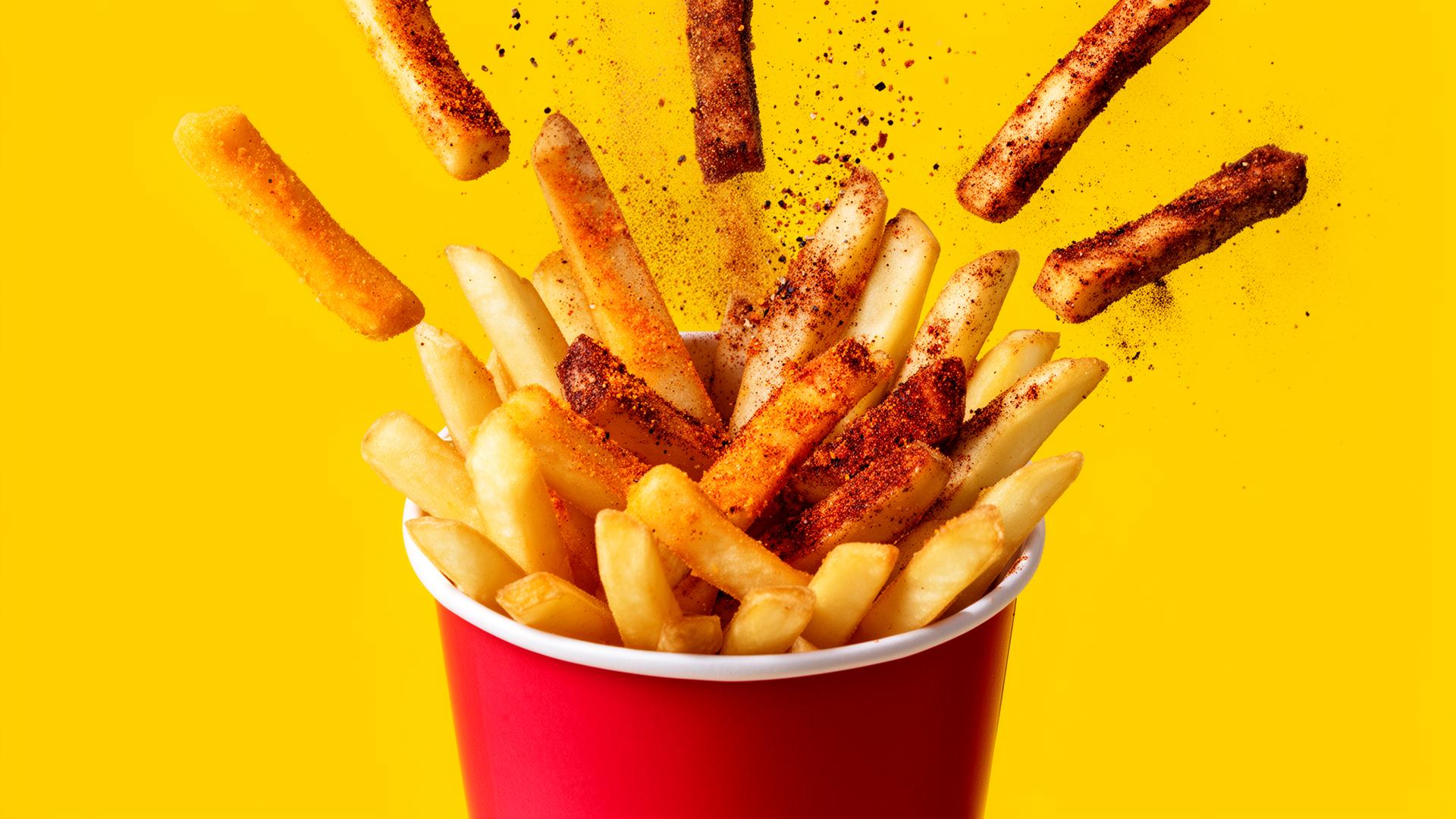 Cup of Chipoz flavoured fries with seasoning